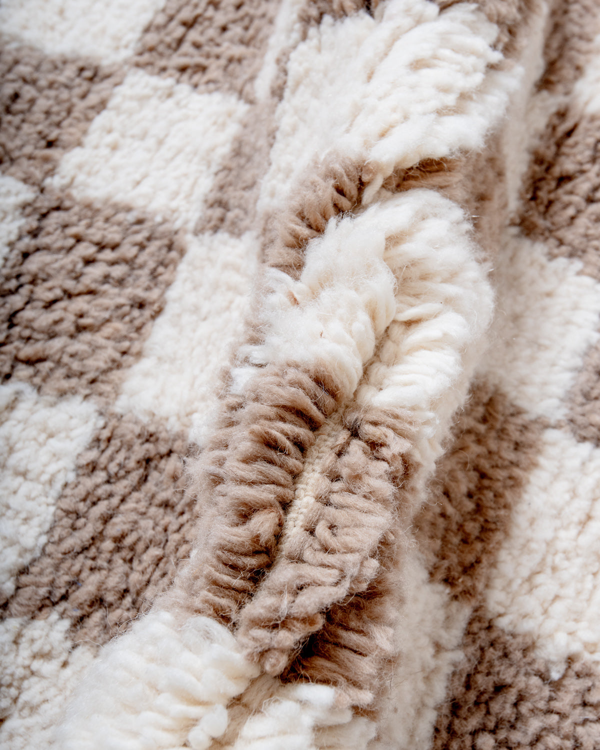 Modern, designer, handcrafted Berber rug from Morocco. Beniourain carpet with beautiful colours and patterns and fluffy wool texture.